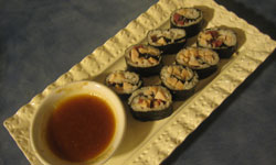 deli roll sushi with dipping sauce 